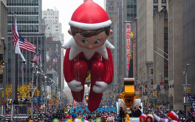 The Elf on the Shelf balloon floats down Sixth Avenue during the 88th Annual Macy's Thanksgiving Day Parade in New York