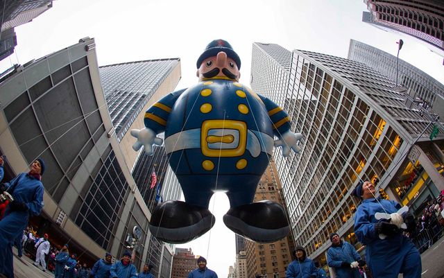 The Harold the Policeman balloon floats down Sixth Avenue during the 88th Annual Macy's Thanksgiving Day Parade in New York