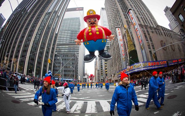 The Harold the Fireman balloon floats down Sixth Avenue during the 88th Annual Macy's Thanksgiving Day Parade in New York